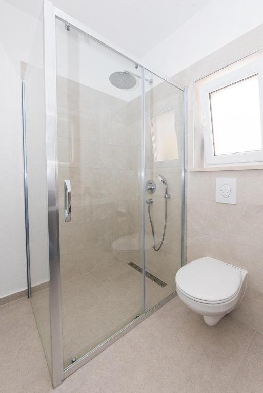 Koupelna v ubytování Apartments Kralj 2