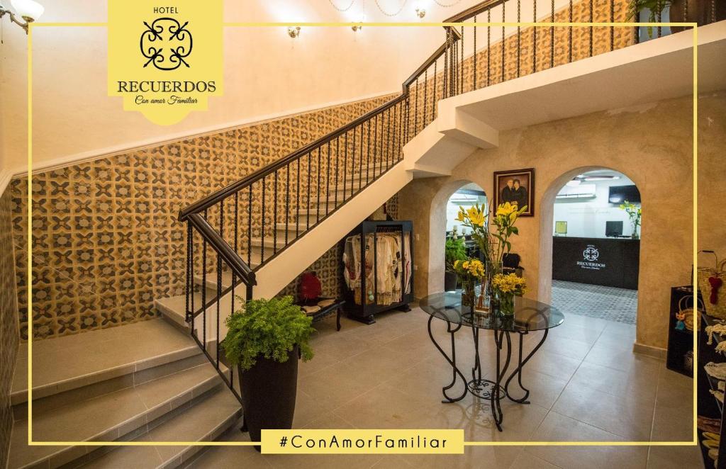 a store with a staircase in a building at Hotel Recuerdos in Valladolid