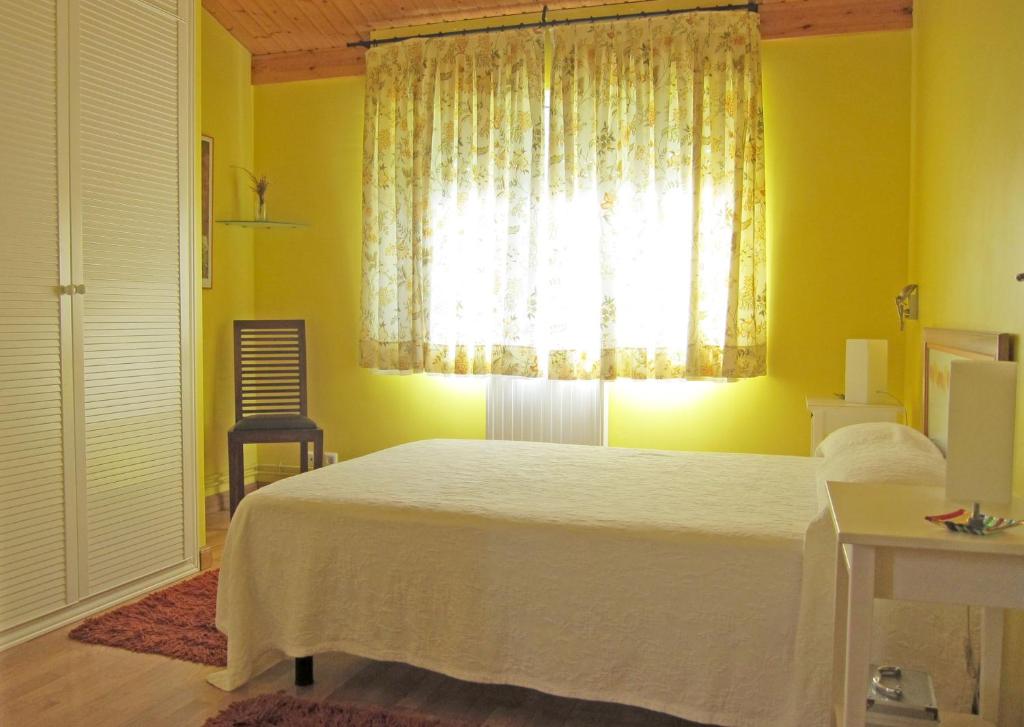 A bed or beds in a room at Arcobaleno
