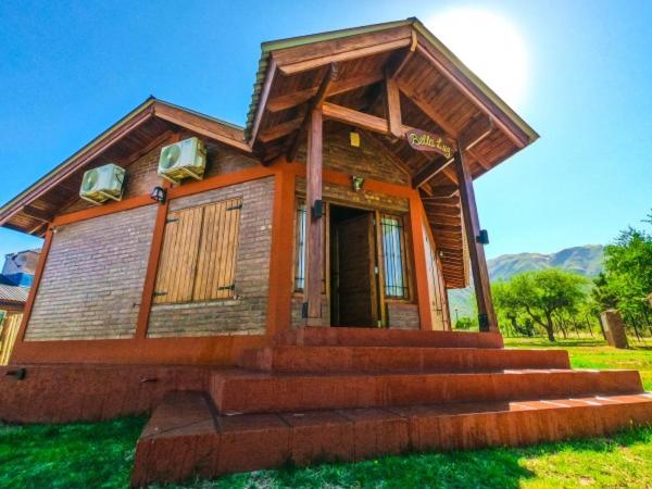 a small house with steps leading up to it at Cabañas Juan Pedro in Los Molles