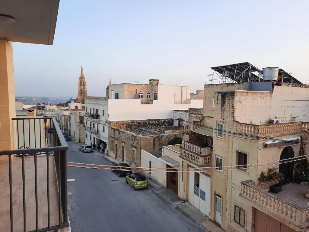 Nespecifikovaný výhled na destinaci Għajnsielem nebo výhled na město při pohledu z apartmánu