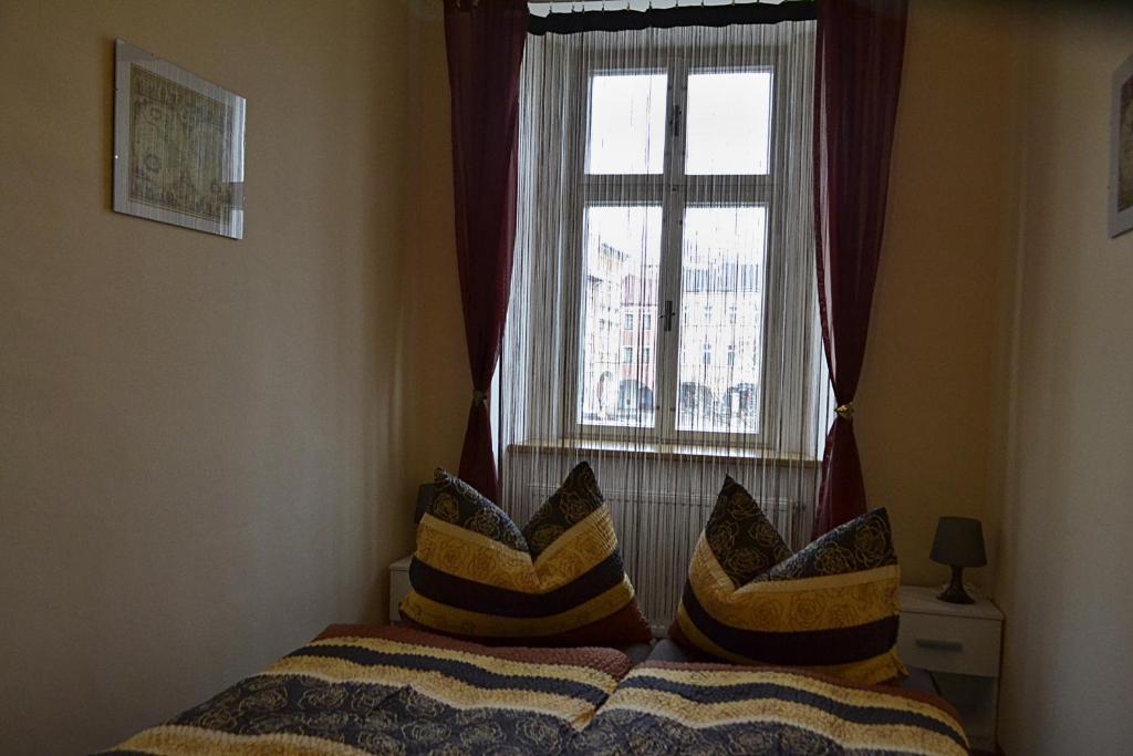 Postel nebo postele na pokoji v ubytování Apartmán Náměstí Hostinné