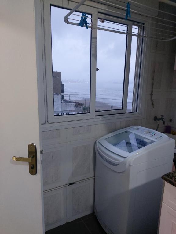  Apartamento 2 dormitórios frente ao mar