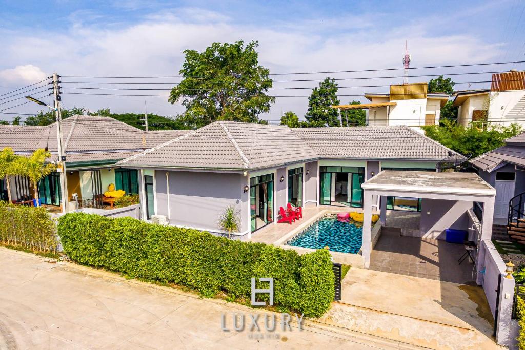 an overhead view of a house with a swimming pool at Cozy 3 Bedroom Pool Villa - SPN2 in Hua Hin
