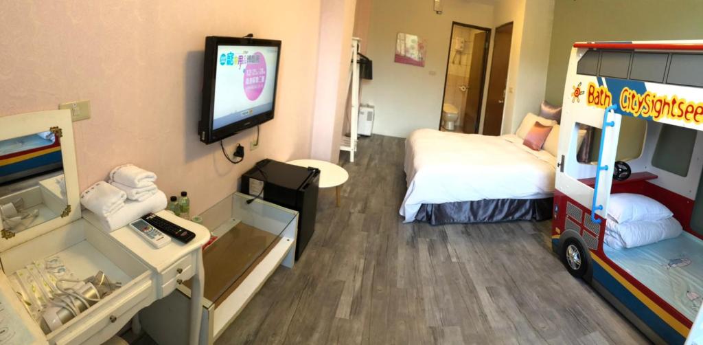 Postel nebo postele na pokoji v ubytování Sun Moon Lake Loft Inn