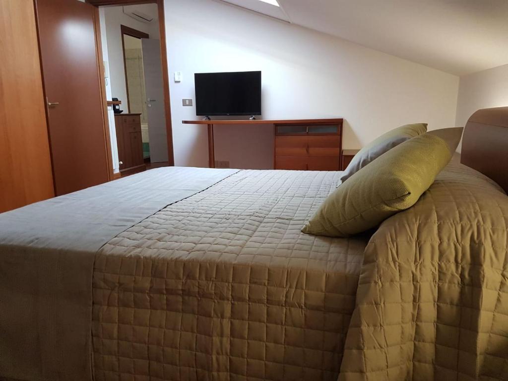 A bed or beds in a room at Dalla Giò