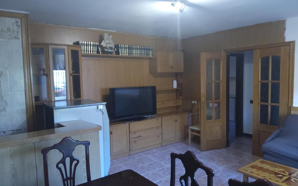 TV a/nebo společenská místnost v ubytování Holidays Domus Iano