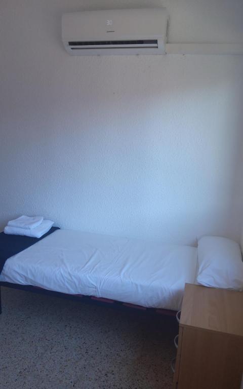 Postel nebo postele na pokoji v ubytování Holidays Domus Iano