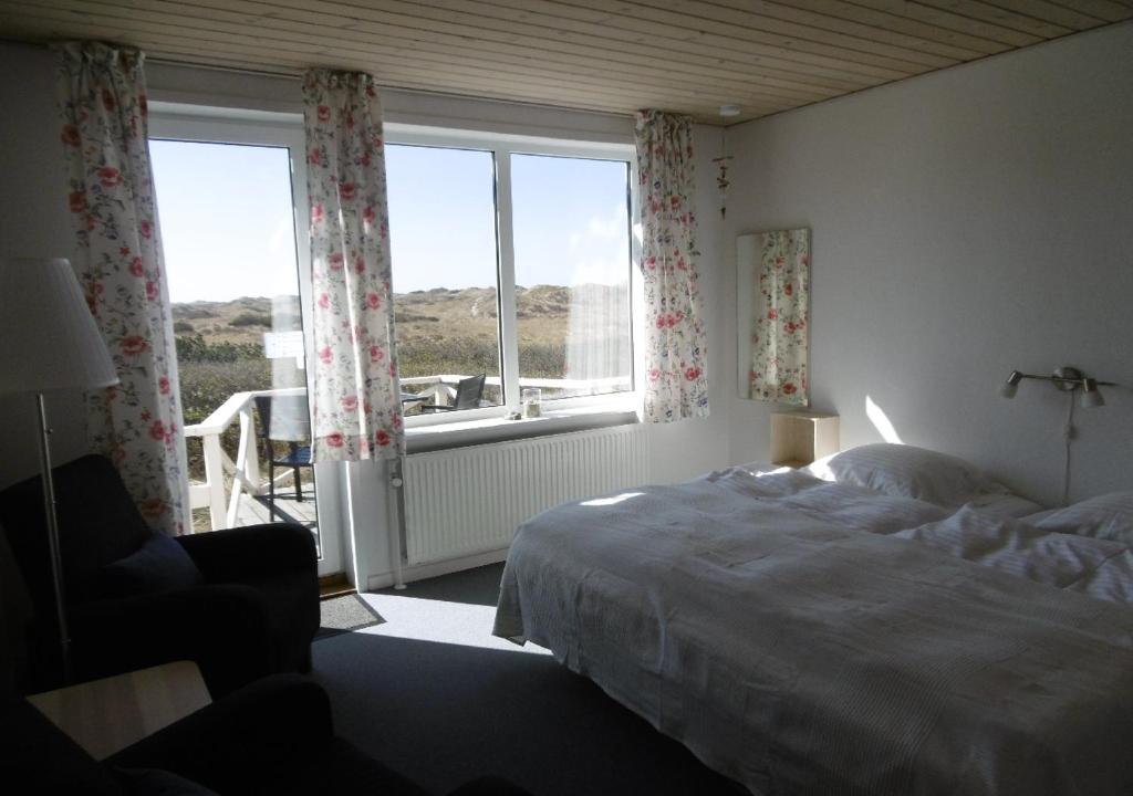 Postel nebo postele na pokoji v ubytování Munchs Badehotel