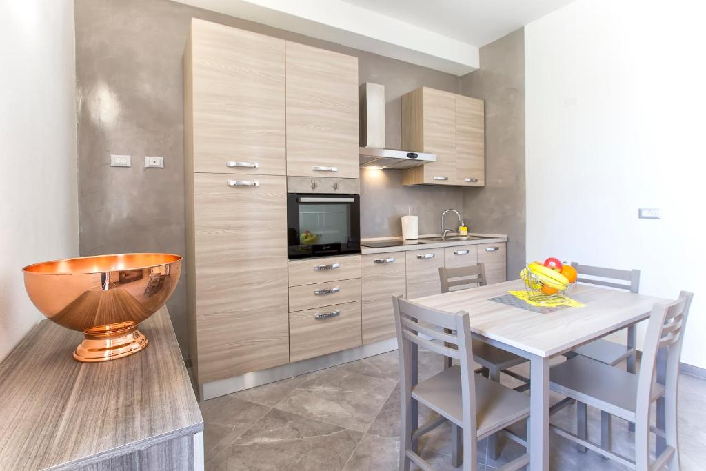 Kuchyň nebo kuchyňský kout v ubytování Nonna Adelina Apartments & rooms