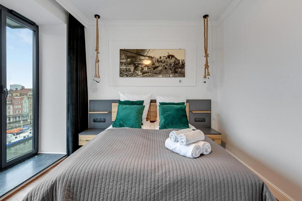 Posteľ alebo postele v izbe v ubytovaní Deo Plaza Luxury Apartments by Blue Mandarin