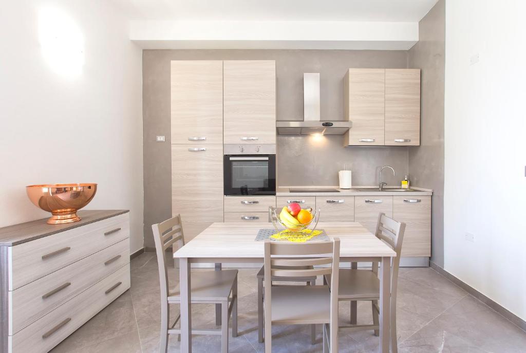 Kuchyň nebo kuchyňský kout v ubytování Nonna Adelina Apartments & rooms