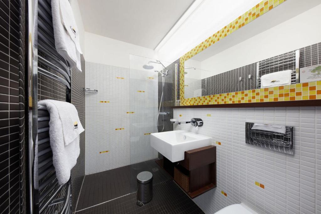 Koupelna v ubytování Hotel Slunný Dvůr