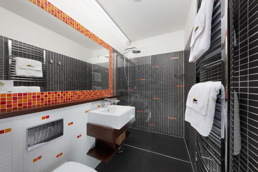 Koupelna v ubytování Hotel Slunný Dvůr