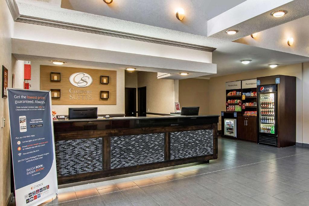 a lobby of a store with a cash counter at Comfort Suites Near Vancouver Mall in Vancouver