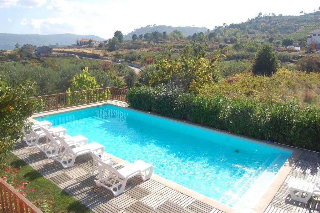 Vista de la piscina de Outros Tempos - Turismo de Aldeia o alrededores