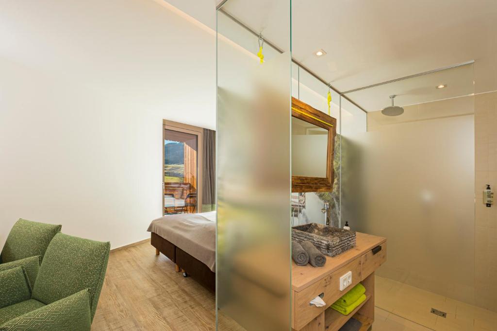 Postel nebo postele na pokoji v ubytování Lifesport Hotel Hechenmoos