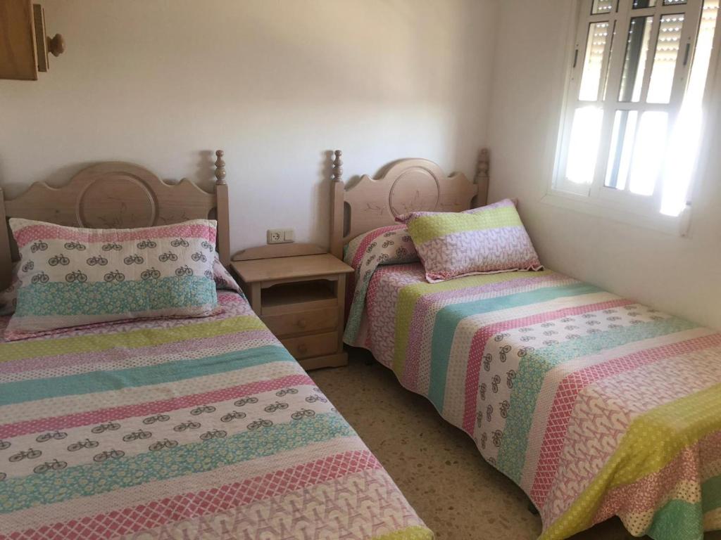 A bed or beds in a room at Sanpau