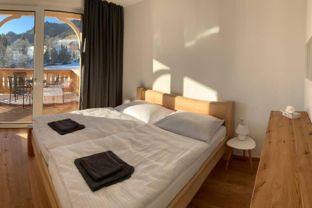 Posteľ alebo postele v izbe v ubytovaní Apartman Hechlstein v Tauplitz