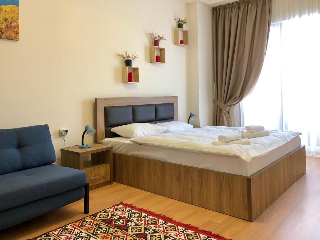 Postel nebo postele na pokoji v ubytování GVC 2-room 116-2 New Gudauri