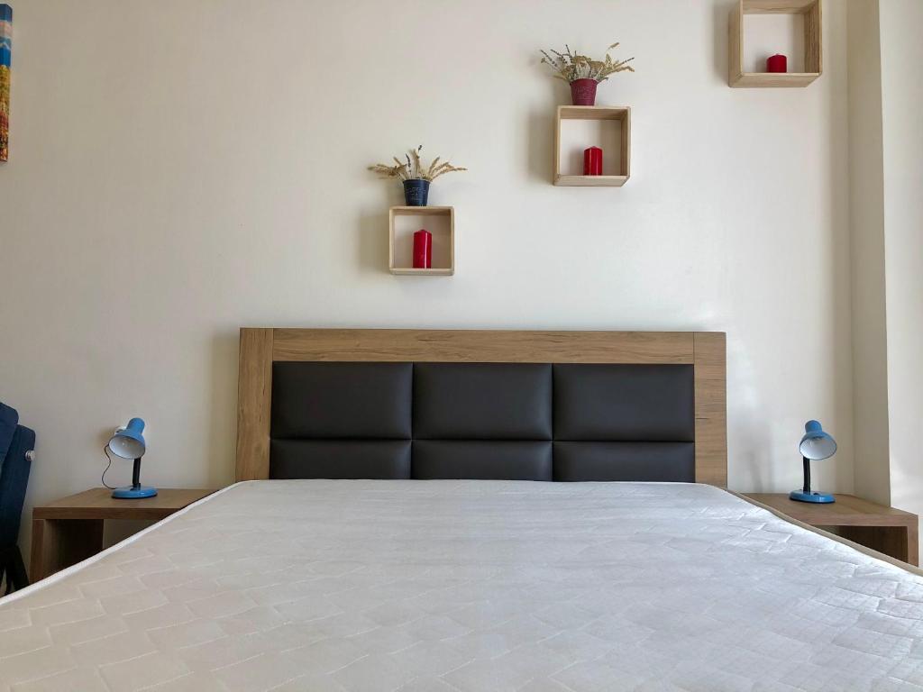Postel nebo postele na pokoji v ubytování GVC 2-room 116-2 New Gudauri