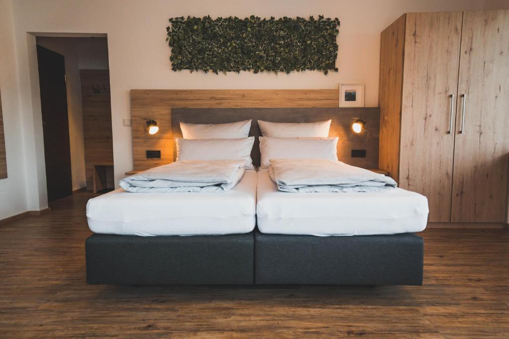 Postel nebo postele na pokoji v ubytování Hotel verWeiler