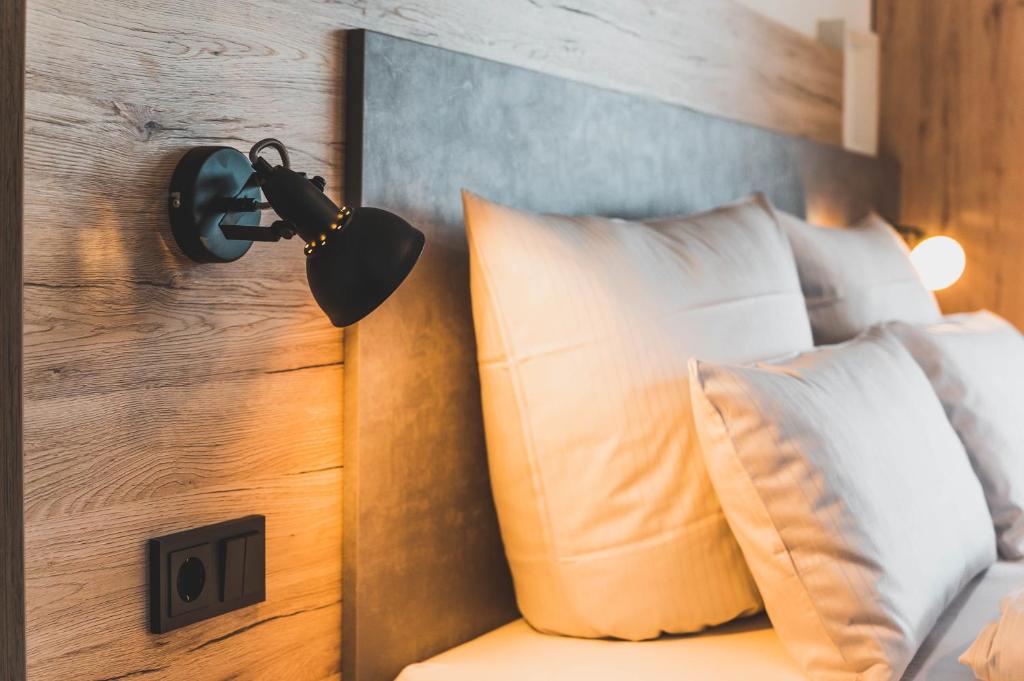 Postel nebo postele na pokoji v ubytování Hotel verWeiler