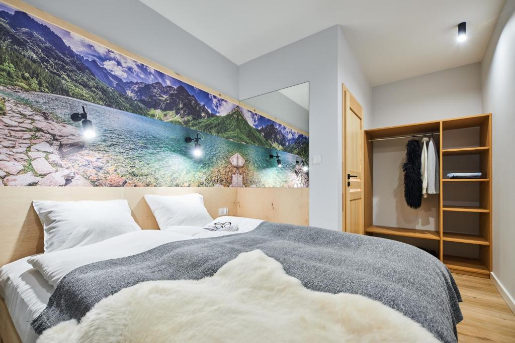 Posteľ alebo postele v izbe v ubytovaní VIP Apartamenty, ORKANA APART