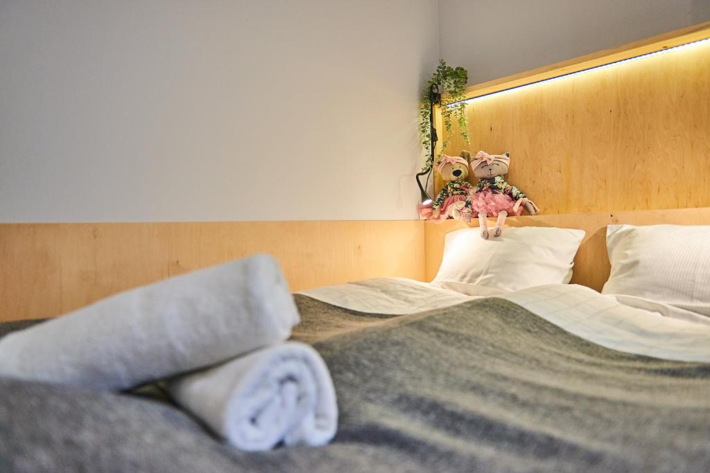 Posteľ alebo postele v izbe v ubytovaní VIP Apartamenty, ORKANA APART