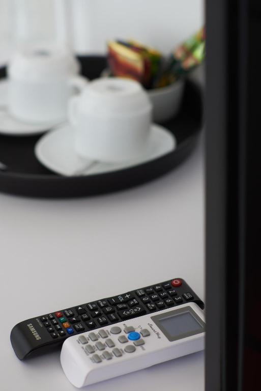 TV a/nebo společenská místnost v ubytování Atmosfera Hotel