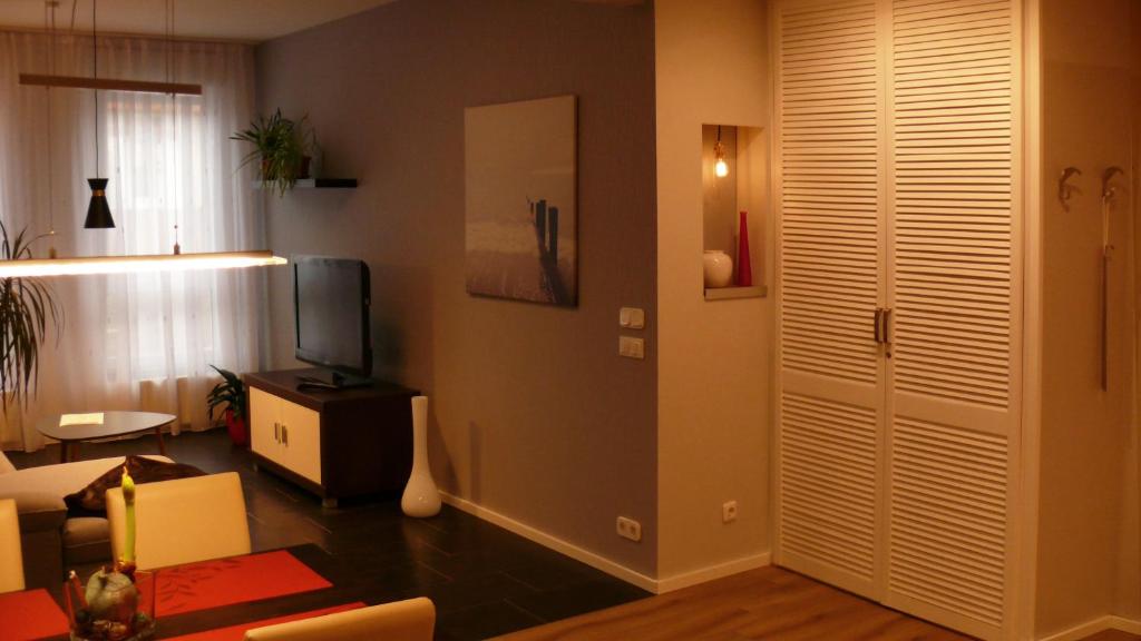 TV a/nebo společenská místnost v ubytování Ferienapartement Stuermer