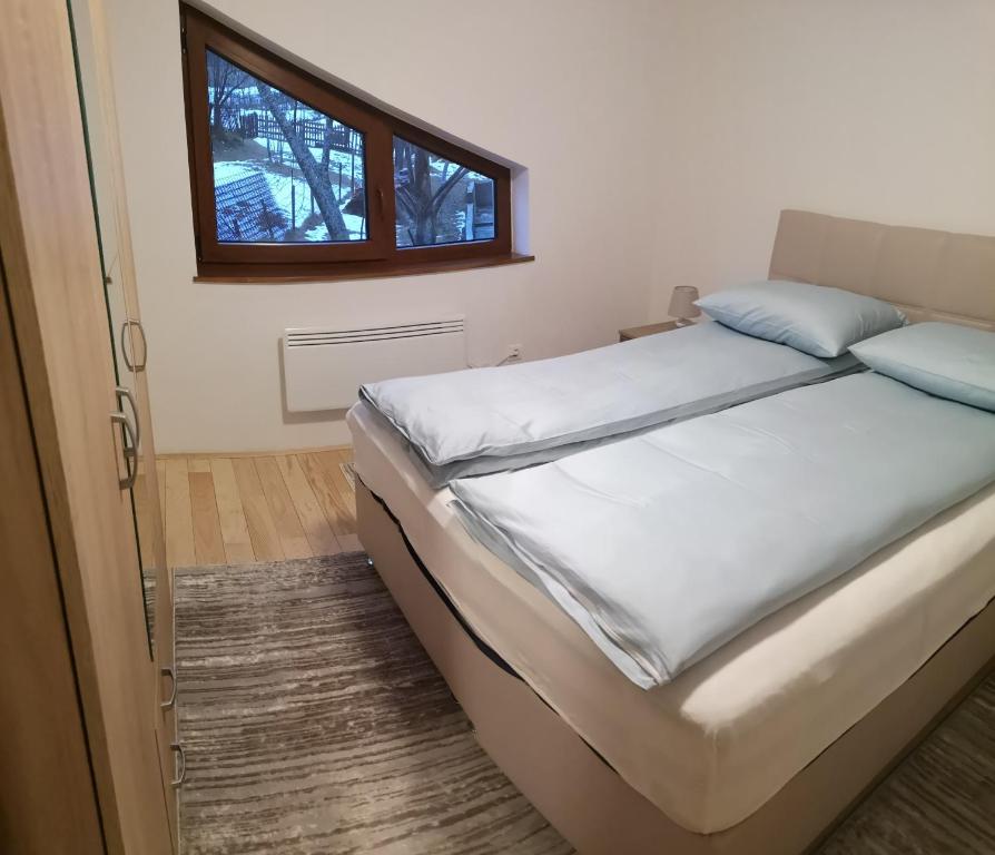 Ένα ή περισσότερα κρεβάτια σε δωμάτιο στο Mountain home JASNA