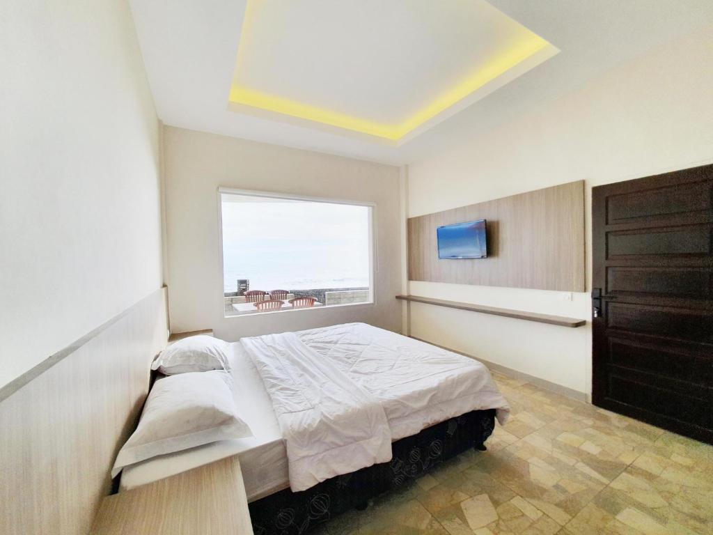 Postel nebo postele na pokoji v ubytování 77 Sunset Plaza