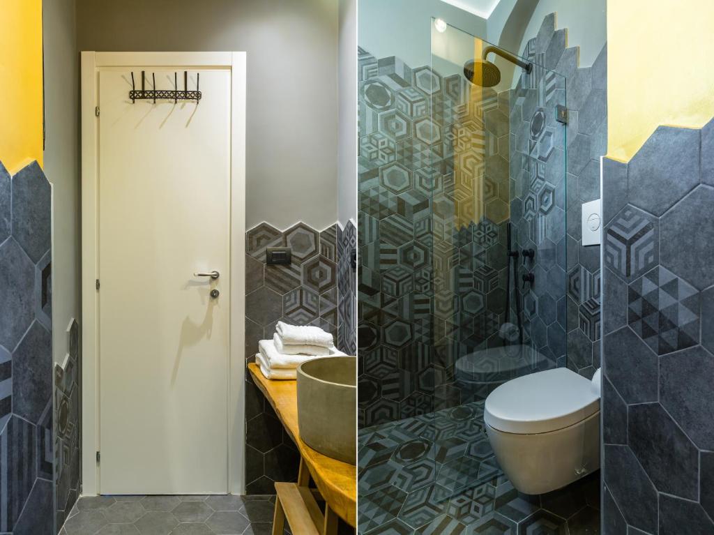 A bathroom at Starhost - MINERVA SUITE seaview