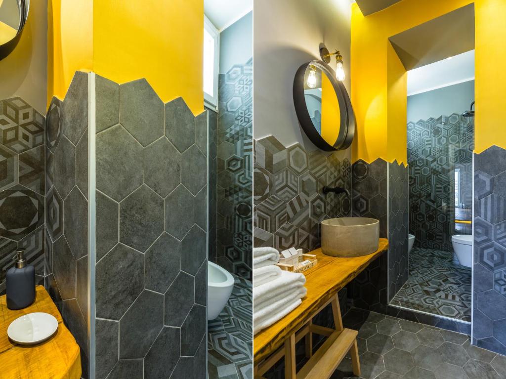 A bathroom at Starhost - MINERVA SUITE seaview