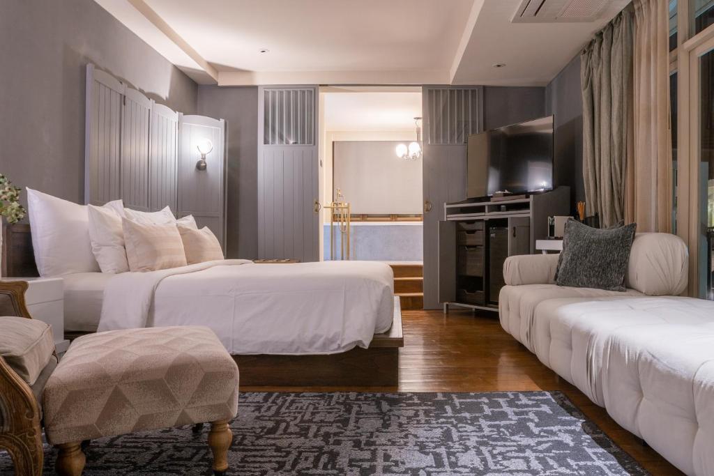 Postel nebo postele na pokoji v ubytování B House Samui