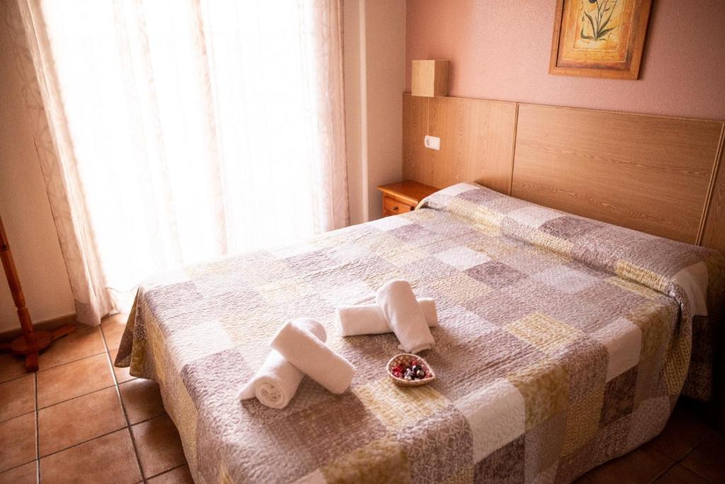 Postel nebo postele na pokoji v ubytování El Cordobés , alojamiento y habitaciones