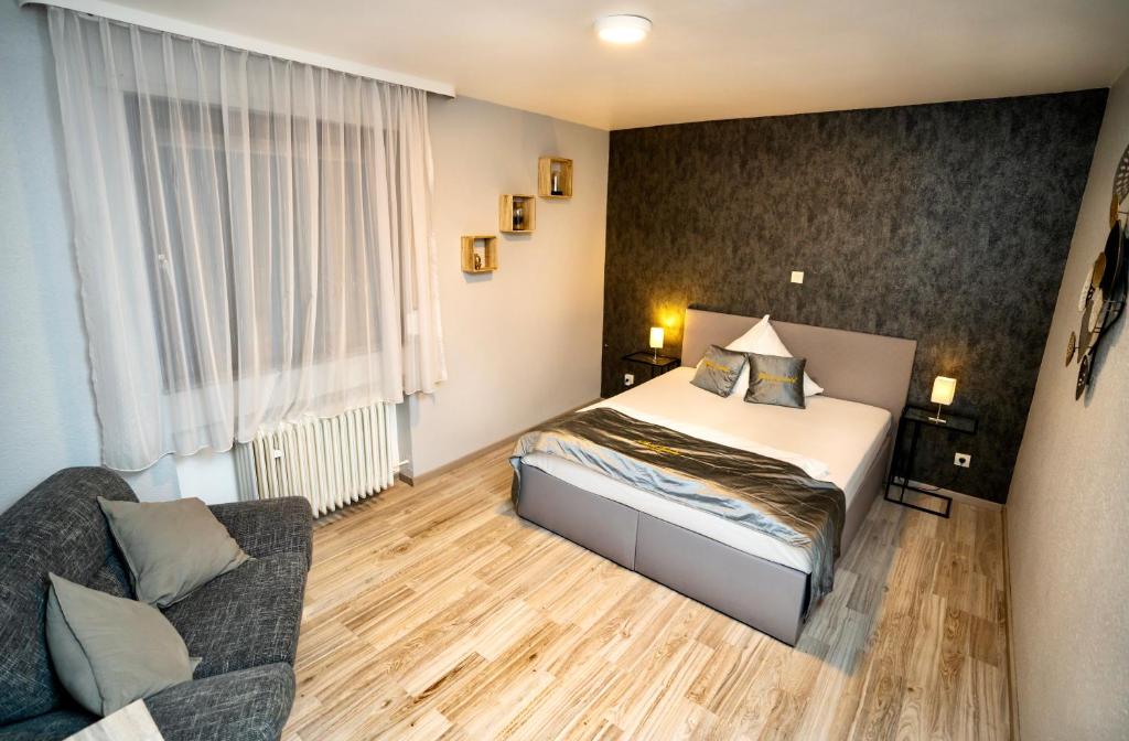 Postel nebo postele na pokoji v ubytování Parkhotel Lindenhof - KOSTENLOSE PARKPLÄTZE
