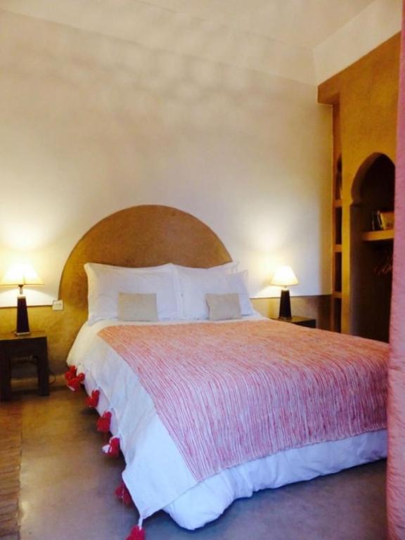 Letto o letti in una camera di Riad Magellan Yoga and Spa