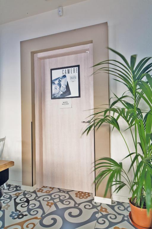Televízia a/alebo spoločenská miestnosť v ubytovaní Amalia Bakery Home
