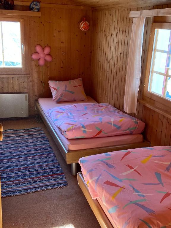 Postel nebo postele na pokoji v ubytování Tgesa Frena