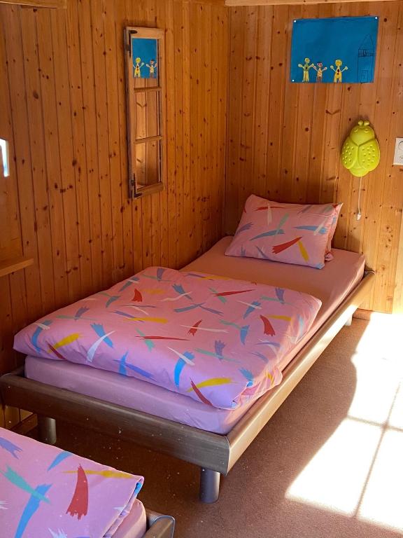 Postel nebo postele na pokoji v ubytování Tgesa Frena