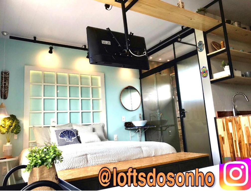 Télévision ou salle de divertissement dans l'établissement Loft's do Sonho LOFT 01