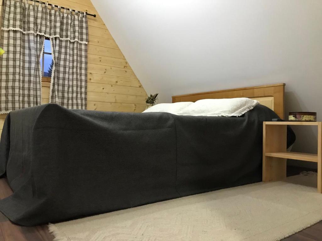 Postel nebo postele na pokoji v ubytování Planinski biser Mokra Gora