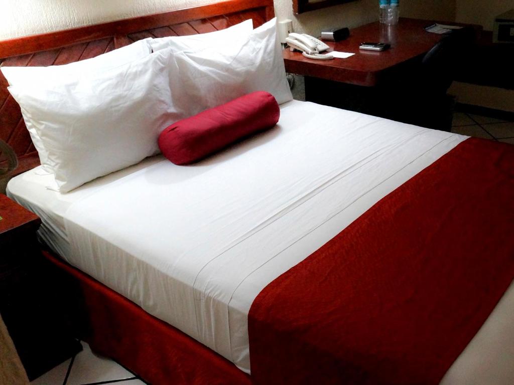 Postel nebo postele na pokoji v ubytování HOTEL BRISA Coatzacoalcos