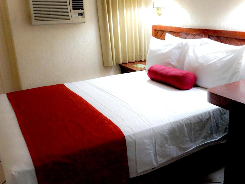 Postel nebo postele na pokoji v ubytování HOTEL BRISA Coatzacoalcos