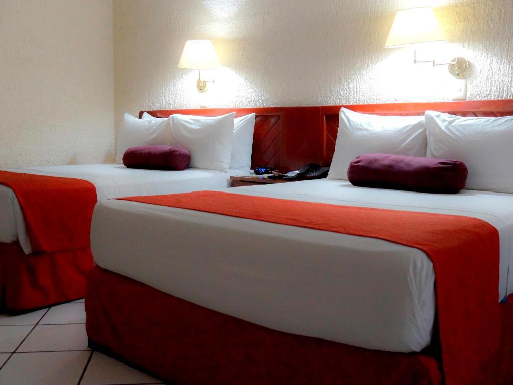 Postel nebo postele na pokoji v ubytování HOTEL BRISA Coatzacoalcos