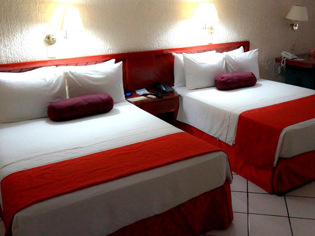 Postel nebo postele na pokoji v ubytování HOTEL BRISA Coatzacoalcos