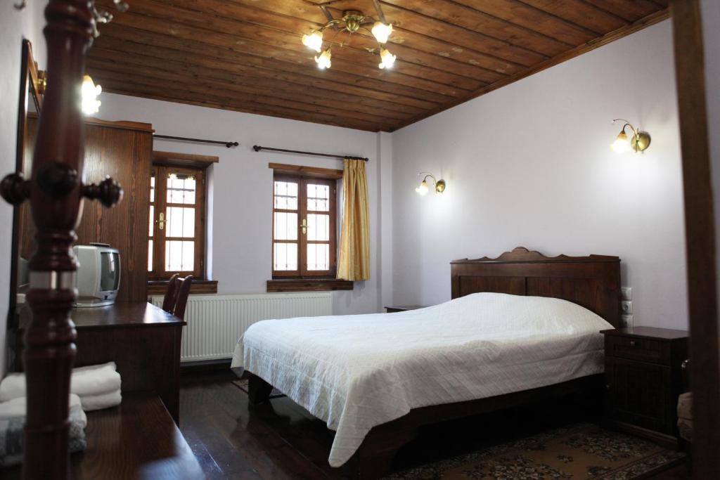 Postel nebo postele na pokoji v ubytování Manis Hotel
