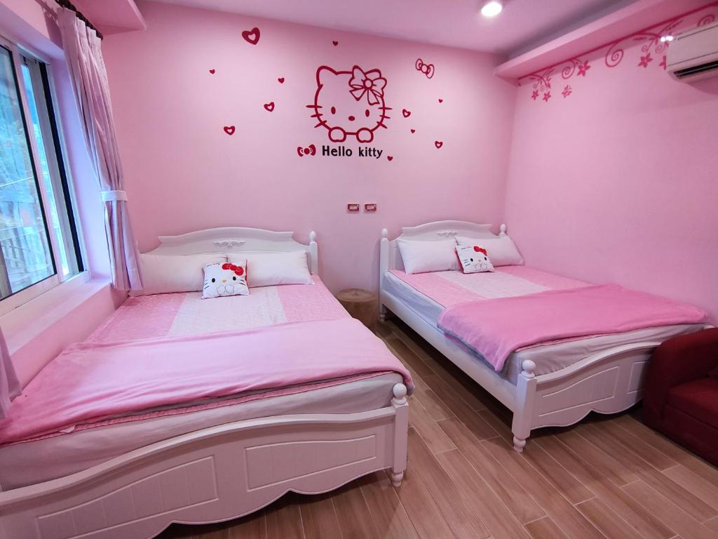 Postel nebo postele na pokoji v ubytování Fei Ying Homestay